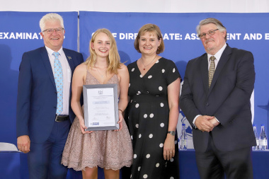 Premier Alan Winde, Minister Debbie Schafer, and WCED Head of Department, Brian Schreuder with top SA academic learner, Madelein Dippenaar. 