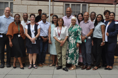 Dr Shaheem De Vries poses with the management team of Groote Schuur Hospital.