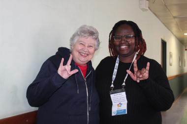 81 year old Mrs Jennifer Gillespie is happy to have been assisted through the sign language interpreter, Unathi Kave.