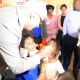 Prof. Craig Househam and Minister Theuns Botha administering polio drops.