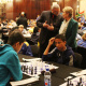 Adv. Lyndon Boauh of DCAS and Minister Marais observing young players at the SA Chess Open