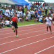 Athletes competing on the new athletics track