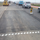 Base patches with ramped edges backfilled with bitumen treated material along the northbound carriageway of the R27.