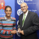 Beurick Kayser receives the Junior Sportsman of the Year award from Dr Bouah