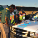 Traffic officers issue a driver with a fine in Beaufort West.