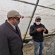 Byron Booysen showing minister Ivan Meyer his innovative pest control system