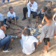 Children from the local community baking stick bread during one of the activities