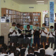 Children participating in a reading session inside the new library