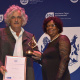 Hein Marais accepting his award for Best Contribution to Crafts and/or Design from Jane Moleleki