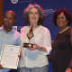 Representatives from PRAESA/Nal’iBali accepting an award for Best Contribution to Language Development from Jane Moleleki
