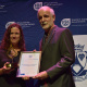 A representative from the Afrikaanse Taalmuseum en –monument in Paarl collecting an award for Best new Museum Project from Andrew Hall