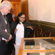EPWP Intern, Lucretia Petersen at SA Sendinggestig Museum explaining to Minister Cronin about documenting the museum artefacts.