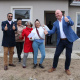 Provincial Minister of Infrastructure, Tertuis Simmers, alongside Mayoral Committee Member (MMC), James Vos, handed over house keys to 10 beneficiaries at the Our Pride housing project, in Eerste River.