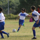 Girls football team in action