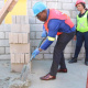 Minister Bonginkosi Madikizela joins the Nelson Mandela Day Initiative to build 100 homes for 100 families