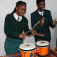 Learners from Langa High School use a spice container, pipe and stick to support the viby marimbas on the veranda of the Cape Medical Museum