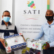  Minister Ivan Meyer left and Clayton Swart from SATI with China campaign cartons