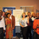Minister Anroux Marais and other VIPS with the new poster, practising their Sign Language