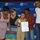 Minister Anroux Marais congratulates young Aiden who won the award for Best Supporting Actor