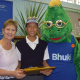 Minister Anroux Marais and mascot Bhuki awarded Joshwin Bizaare for improved reading skills at the afternoon classes at the Monte Rose Library