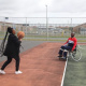 Minister Mbombo joining the patients on basketball court. 