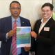 Dr Ivan Meyer and Dr Kandass Cloete with a copy of the BFAP Study Report on the Impact of the Energy Crisis on Agriculture in the Western Cape.
