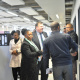 Ministers Donald Grant and Dr Nomafrench Mbombo interact with staff members.