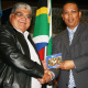 Mr Norman Cloete (principal of Weston High School) and Dr Ivan Meyer at the National Anthem CD handover ceremony.