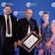 Omar Badsha receives his ministerial commendation from Minister Anroux Marais and HOD Brent Walters at the annual Cultural Affairs Awards Ceremony in Cape Town