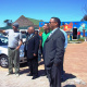 One of the visual artists shows the minister and other dignitaries the new look at Siyabonga Care Village on Friday.