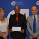Overberg Sport Council Chairperson Rudolph Johannes received their cheque from Minister Anroux Marais