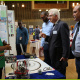 Minister Alan Winde is intrigued by the work done by one of the exhibiting organisations, Helderberg Robotics during the YSRP Programme. 