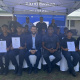 seated in front in the centre is Western Cape Minister of Police Oversight and Community Safety, Reagen Allen on the left and next to him is the Bergrivier Municipality Executive Mayor, Alderman Ray van Rooy.