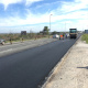 Road users being accommodated while the asphalt overlay is being placed on the M19.
