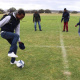 Soccer players warm up before competing at the Overberg BTG