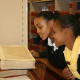 Students reading books at the archives