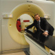 Minister Theuns Botha smiling broadly about the benefits the new Big Bore CT Scanner holds.
