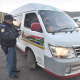 Traffic Officer Marco Arries inspects a minibus taxi.