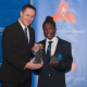 Vuyiseka Avril, winner of the category Sportswoman with a Disability of the Year from WPSAPD, receives her award from JP Naude