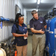 Minister Mbombo viewing the water treatment plant, where raw water from the boreholes enters a pre-filtration unit before being pumped in a reverse osmosis system. Thereafter, the water is pumped into Tygerberg Hospital’s reservoirs.