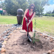 Stikland Hospital CEO, Lynette van der Berg plants a tree on World Aids Day.