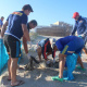 Western Province Rugby players working hard to get Monwabisi beach clean.