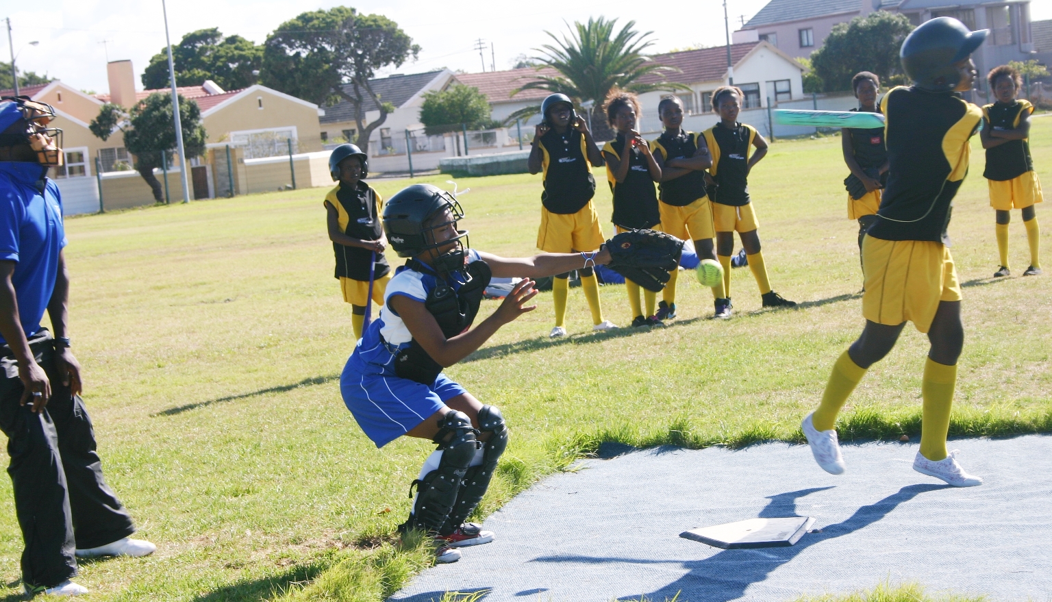Swing and a miss for Masipumele Primary batter.