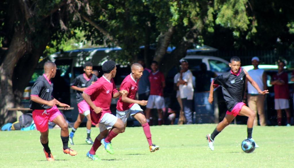 The Metro team takes control of the ball during a soccer match against Central Karoo.
