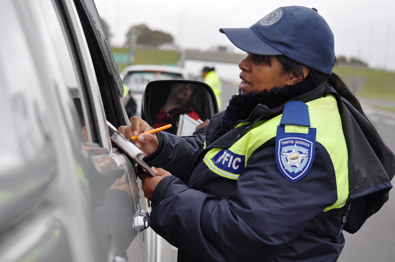 Traffic Officer Wendy Daniels inspects a vehicle on the N2 near Somerset West.