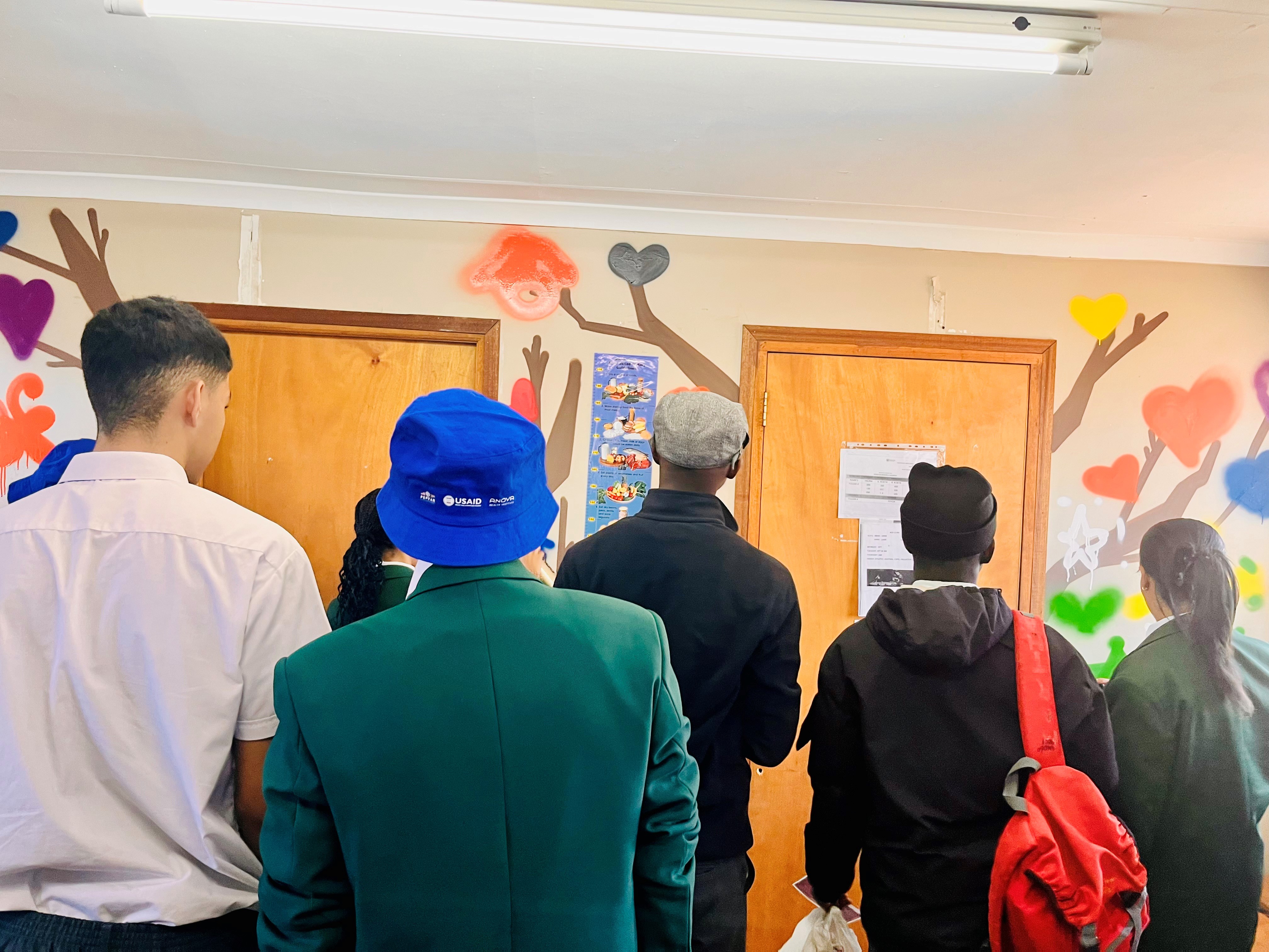 Young people from schools in Bellville South spray painted the walls of their new clinic.