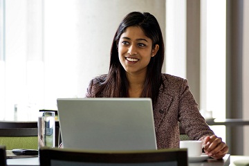 young-business-woman-indian-laptop-desk