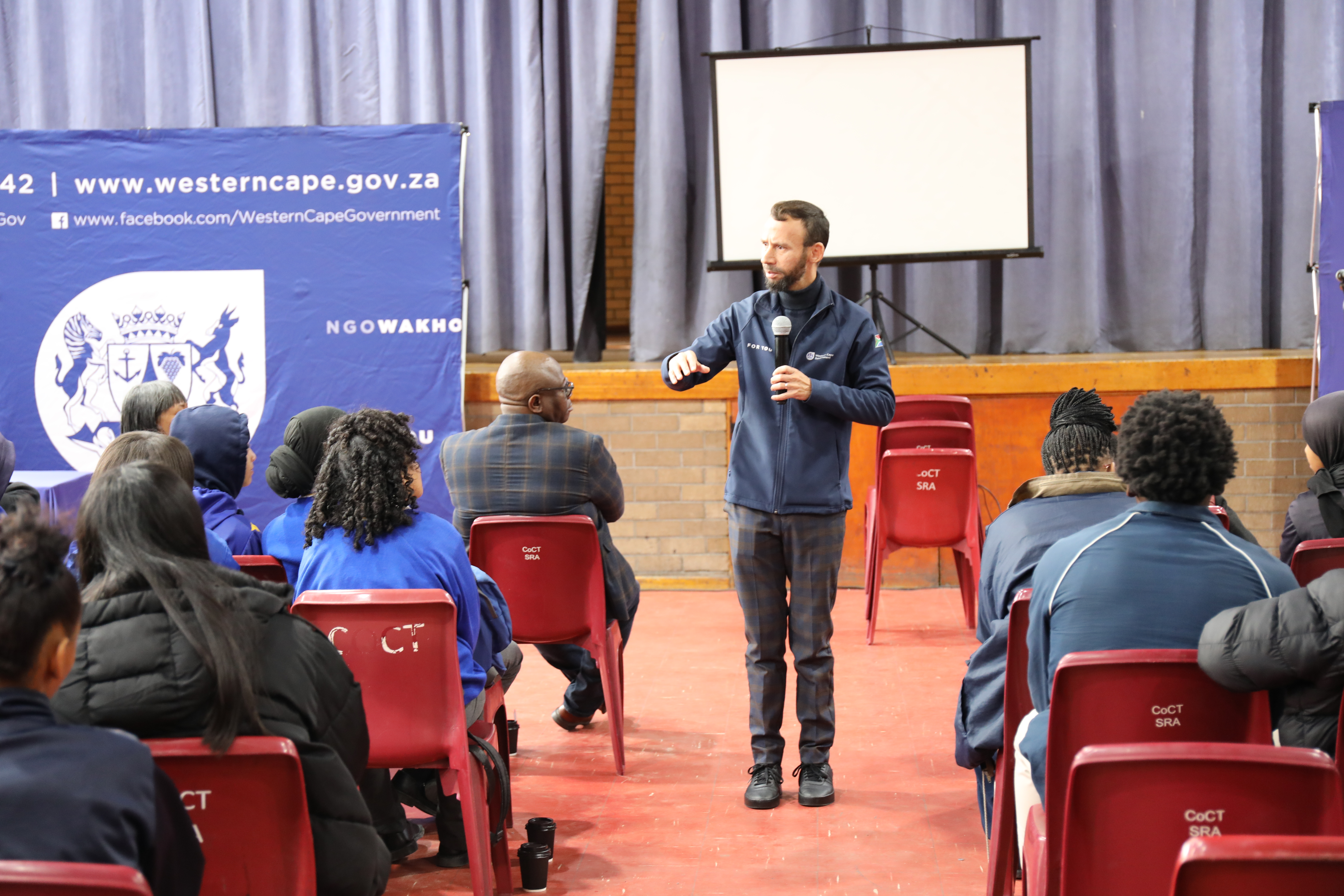 Minister for Police Oversight and Community Safety, Reagen Allen addressing youth at the Delft Youth Programme on 19 June 2023.
